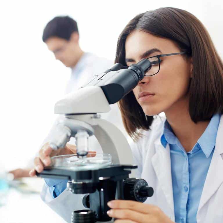 Licensed Practical Nurse looking through telescope