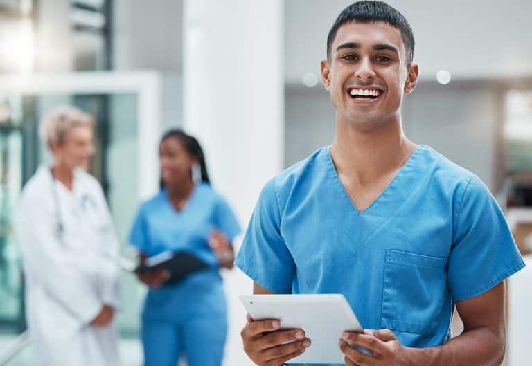 man licensed practical nurse with big smile