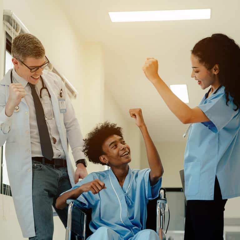 nurse doctor with patient in wheelchair